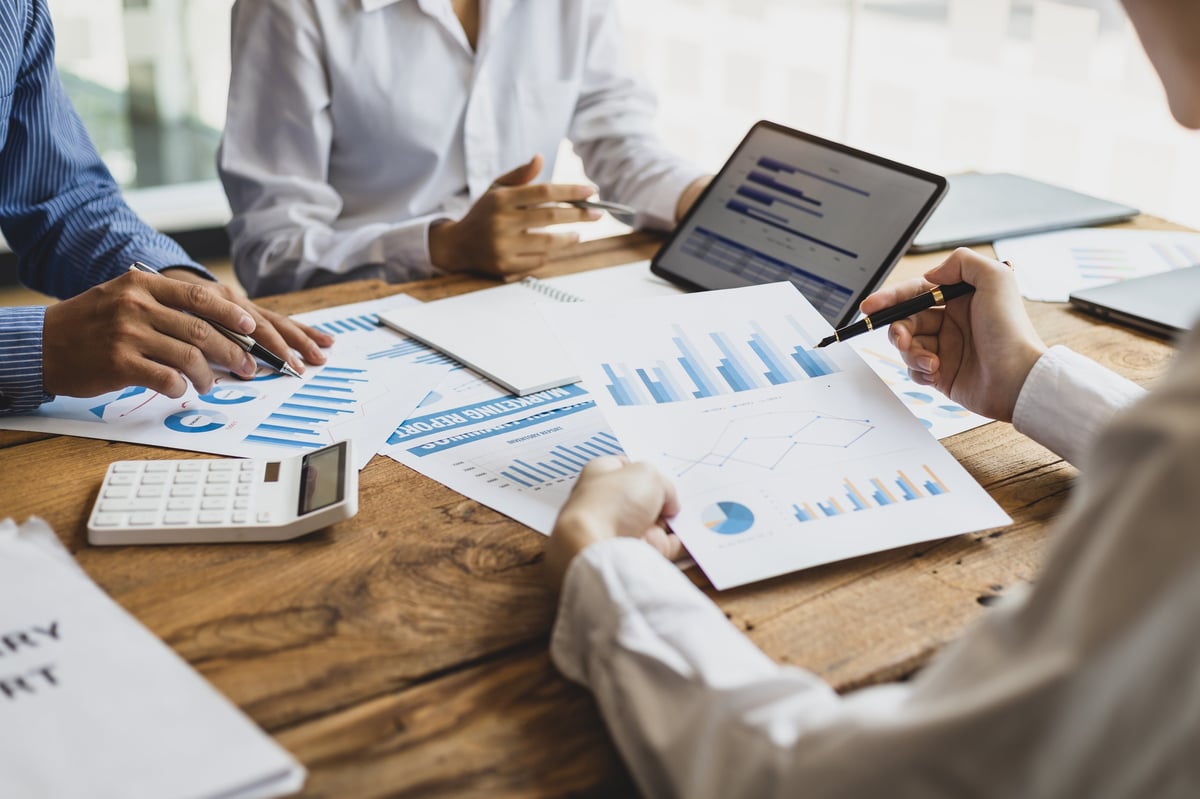 Financial planning analysis with charts and retirement strategy documents