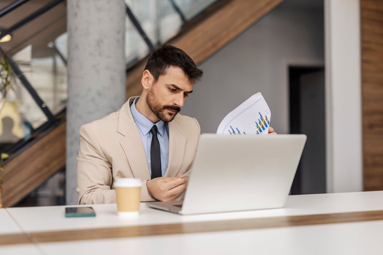 Investor reviewing financial documents