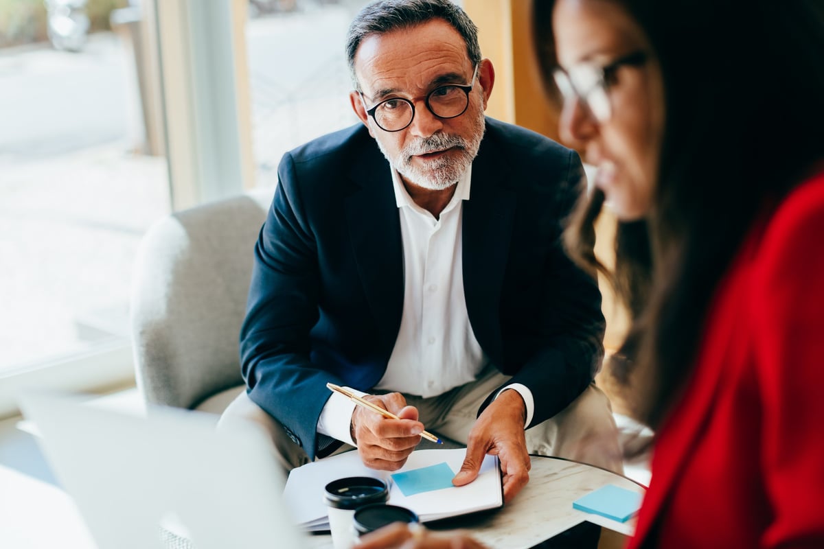Professionals sharing insights and collaborating on a comprehensive financial strategy.